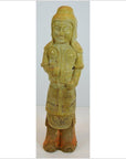 Brown glazed terracotta warrior statue in traditional attire and headgear, ceramic close-up.