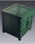 Antique green lacquer cabinet with metal hinges, two front doors, displayed against a gray background.