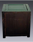 Green lacquer antique wooden cabinet with dark finish, classic Chinese style, close-up view.