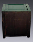 Green lacquer antique wooden cabinet with dark finish, classic Chinese style, close-up view.