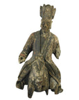 Brown wood hand-carved Chinese merchant statue in tall headdress riding animal, arms and base missing, close-up.