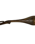 Brown wood hand-carved Indian lute with teardrop shape and handle, vintage style, on plain background.