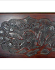Lacquered rosewood wall plaque with hand-carved tiger and floral details, antique finish, close-up view.