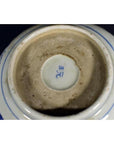 White ceramic bowl with blue Chinese character mark on base.