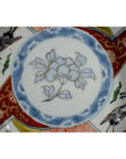 Blue and white porcelain Imari bowls set of 4, hand painted with floral, crane motifs and geometric borders.