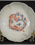 Set of 4 multicolor hand painted porcelain Japanese Imari bowls with dragon designs on decorative stands.