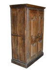 Warm wood antique Indian cabinet with intricately carved doors, angled view.