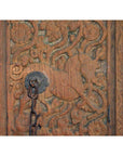 Brown sheesham wood antique Indian door with horse motifs, ornate floral carvings, and central iron hardware.