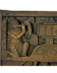 Brown sheesham wood temple plaque, antique, hand-carved with kneeling figure and ornate structure, early 20th century.