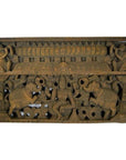 Brown Sheesham wood temple plaque with hand-carved deities and ornate religious figures, early 20th century.