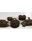 Brass and iron antique Indian locks with original keys on a white surface.