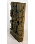 Brown sheesham wood carving with multiple figures in traditional attire, angled view.