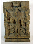Brown sheesham wood Shiva statue with two smaller figures, Indian antique carving, close-up view.