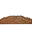 Brown wood Indonesian carving wall decor with scalloped top and geometric patterns, set against a white background.