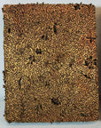 Brown and gold copper batik ink blocks with intricate floral and vine patterns, set of 3, close-up.
