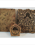 Copper Indonesian batik ink blocks with floral and geometric designs, set of 3 on white background.