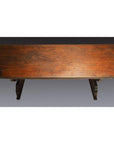 Dark wood antique Japanese desk with rectangular top, two sturdy legs, overhead view.