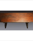 Dark wood antique Japanese desk with rectangular top, two sturdy legs, overhead view.