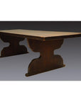 Dark wood antique Japanese desk with rectangular top and two thick pedestal legs, shown against a plain background.