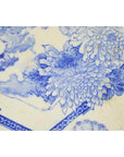 Blue and white porcelain Igezara plate with floral and geometric transferware patterns, antique Japanese style.