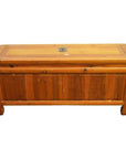 Dark wood antique Chinese Kang chest with brass hardware, drawers, paneled doors, and keyhole front, front view.