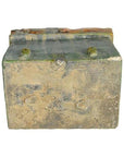 Weathered brown wood miniature Chinese treasure chest with four small top protrusions, close-up view.