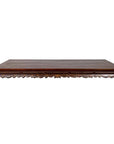 Brown wooden low table with ornate carved legs, inspired by antique Ming Dynasty Kang Opium Bed design, indoor setting.