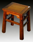 Square Chinese elm antique stool with four sturdy legs and rustic finish, set against a gradient background.