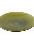 Green ceramic bowl with subtle gradient and glossy finish, close-up on white background.