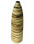 Close-up of a tall, cylindrical ceramic vase with earth-toned brown, tan, and cream horizontal swirled patterns.