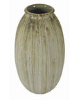 Beige ceramic vase with vertical brown streaks, oval and tall with narrow opening, on plain background.