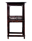 Dark lacquered bamboo lamp table with rectangular top and open shelving, studio product view.