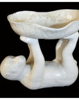 White porcelain monkey bowl, Blanc de Chine style, with monkey figure lifting the ceramic bowl using hands and feet.