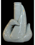 White porcelain swan vase with curved neck forming spout, Blanc de Chine style, close-up view.