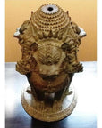 Bronze lamp base with ornate detailing and three outward-facing guardian lions, top view.