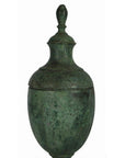 Close-up of bronze urn with fitted lid and pointed finial, weathered greenish surface, very good condition.