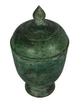 Bronze urn with lid, pointed finial, and subtle verde gris patina on white background.