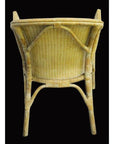 Brown rattan chair with woven back and seat, rear view against a solid black background.