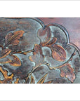 Close-up of 19th-century rosewood wall plaque, hand-carved with lacquered bird and foliage detailing.