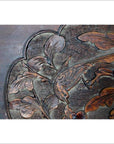 Close-up of 19th century Chinese rosewood lacquered wall plaque with hand-carved bird and foliage details.