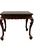 Black lacquered wood hall table with cabriole legs, antique style, shown indoors.