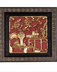 Close-up of red giltwood Chinese floral architectural panel in decorative black and bronze square frame.