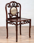 Dark rosewood Chinese antique side chair with marble medallion and open fretwork, shown on a wooden floor.