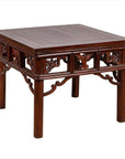 Dark wood Chinese antique side table with open fretwork design, traditional square style, close-up view.