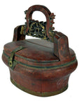 Brown bamboo wedding basket with curved lid and decorative handle, close-up view, in good condition.