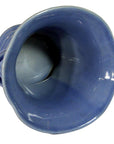 Top view of blue celadon ceramic planter with wavy rim and glossy crackled finish.