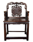 Dark rosewood Chinese chair with carved medallion detail, intricate backrest and arms, early 20th century design.