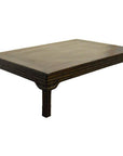 Dark wood rectangular Chinese coffee table with four short legs and subtle carved friezes, studio setting.
