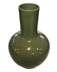 White crackle celadon porcelain vase with round body and long narrow neck, close-up on white background.