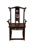Dark patina Chinese elmwood Dengguayi scholar's chair with ornate carvings and curved armrests, front view.
